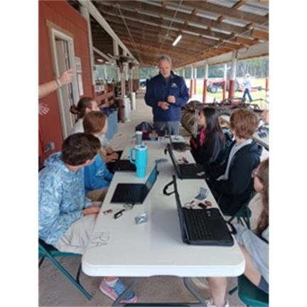 Image of Dr. Russ Clark with students from Effingham College & Career Academy